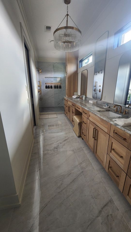 Completed Custom Residence White-Oak Double Vanity and Curbless Marble Spa Shower
