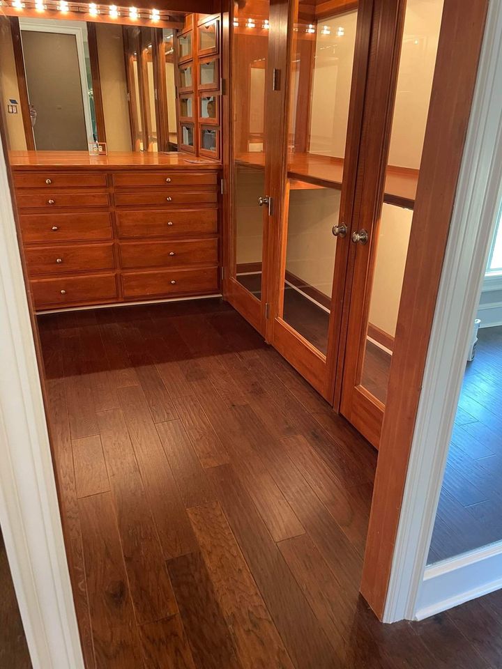 Completed Custom Estate Warm Cherry Glass-Front Dressing Room and Wardrobe Island