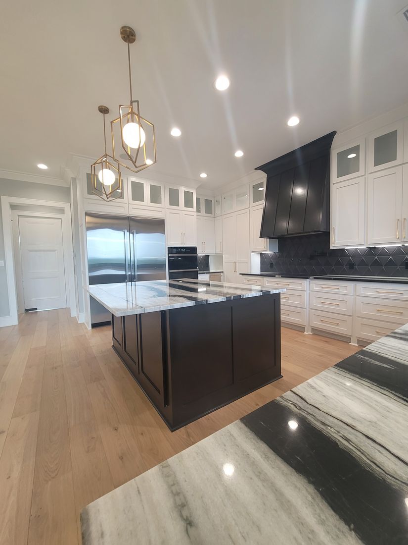Completed Custom Residence Gourmet Kitchen and Quartzite Island