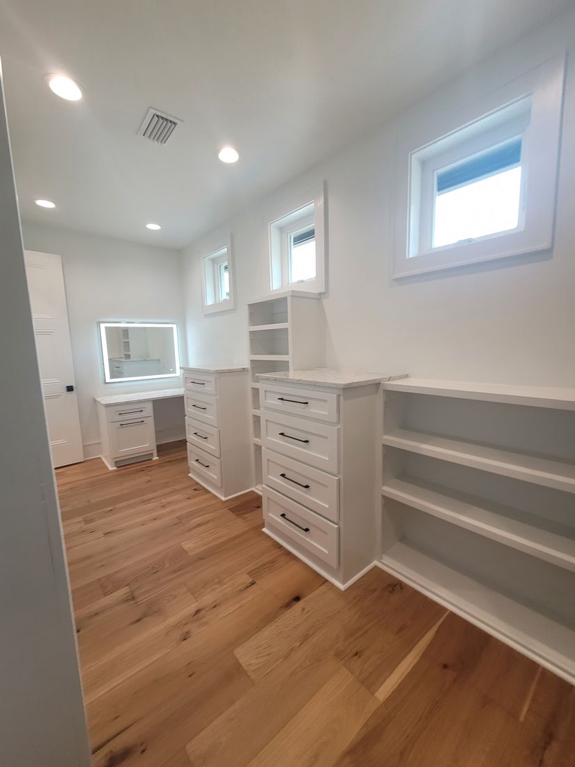 Completed Custom Residence Walk-In Closet Millwork System