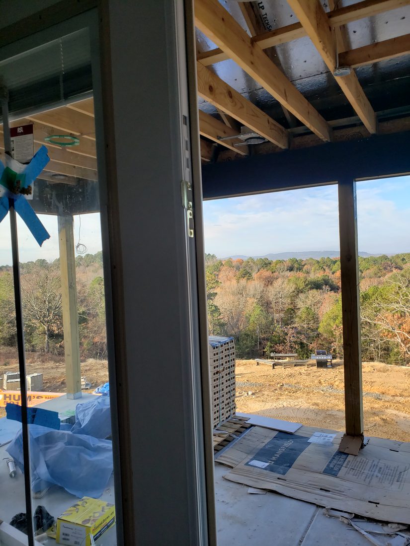 Stage 5 Furgerson Residence Balcony Framing Radiant Barrier Roof and White Brick Pallets