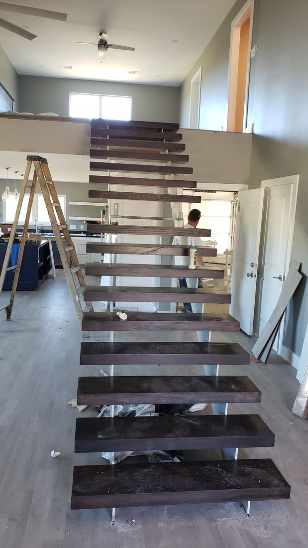 Stage 11 Custom Steel Stringer and Butcher-Block Floating Staircase