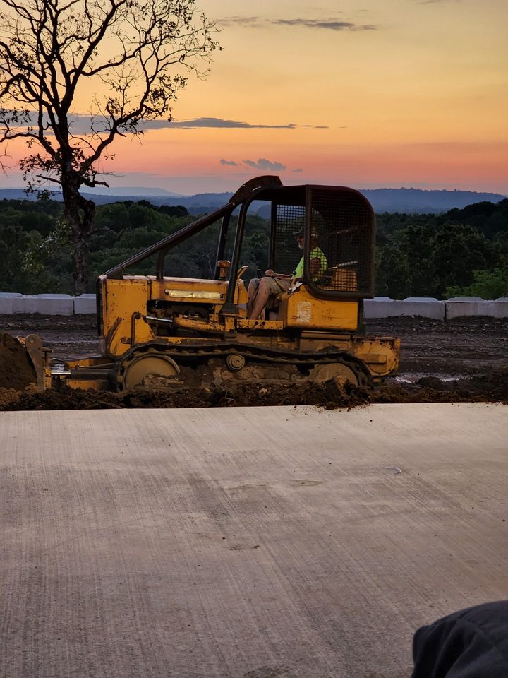 Stage 13 Hillside Monolithic Concrete Slab and Tracked Loader Fine Grading